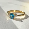 zlatý prsten s topásom a diamantami